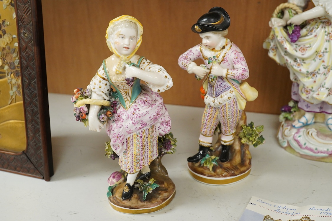 A Meissen style porcelain musical group, a figurine of a lady holding grapes and a two Derby figures of Summer and Autumn, c.1810-30, largest 24cm high